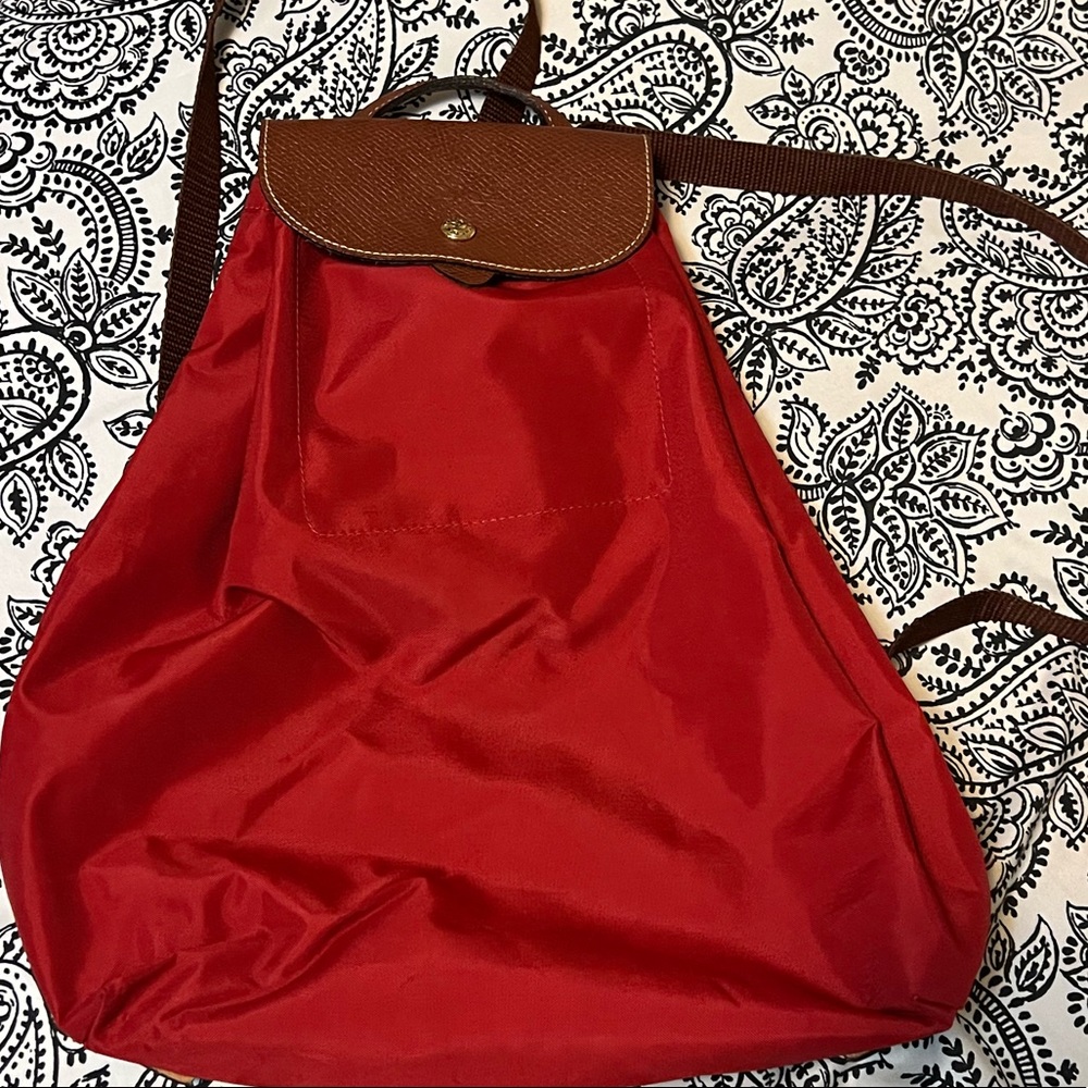 Excellent condition!  Longchamp Le Pliage Nylon Backpack in a vibrant Red